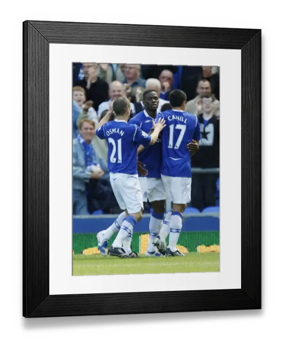 Framed Print : Everton's Triumph: Saha, Osman, and Cahill Celebrate First Goal vs. West Ham United, May 2009 Framed Print : Everton's Triumph: Saha, Osman, and Cahill Celebrate First Goal vs. West Ham United, May 2009