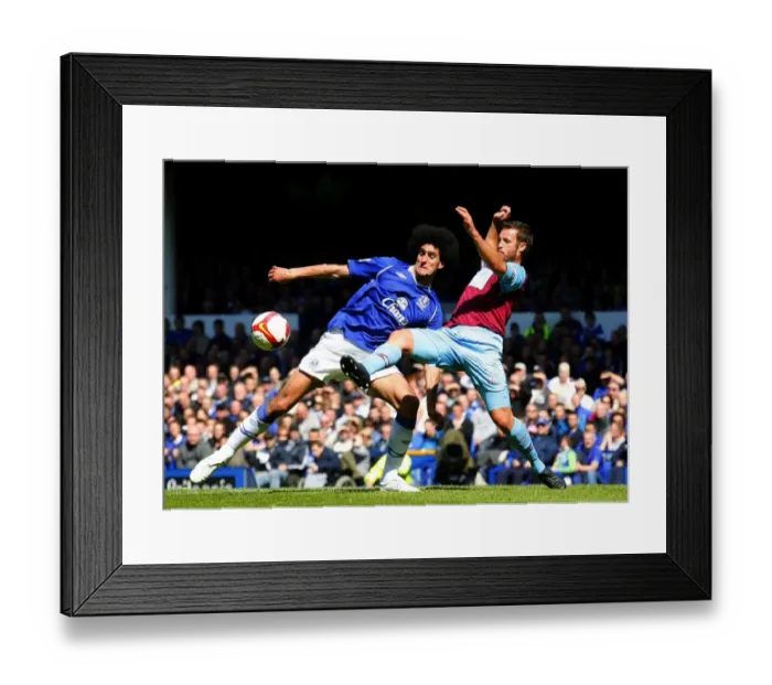Framed Print : Fellaini vs Neill: Clash of the Titans in Everton vs West Ham Premier League Match Framed Print : Fellaini vs Neill: Clash of the Titans in Everton vs West Ham Premier League Match