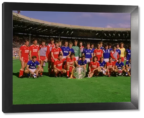 Everton and Liverpool teams share the 1986 Charity Shield