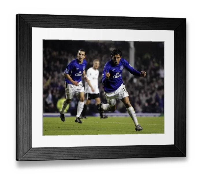 Framed Print : Tim Cahill's Triumphant Goal Celebration: Everton's Game-Changing Moment (Season 05-06) Framed Print : Tim Cahill's Triumphant Goal Celebration: Everton's Game-Changing Moment (Season 05-06)
