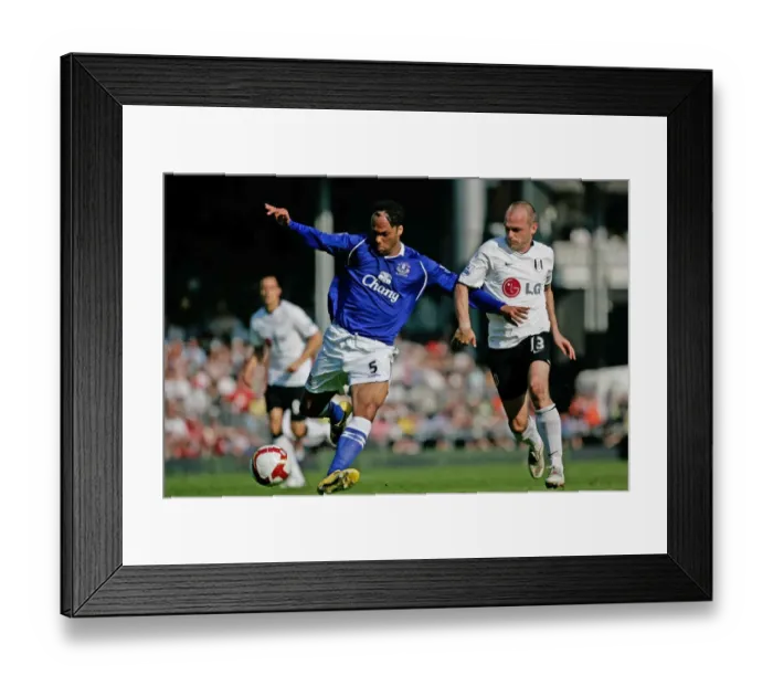 Framed Print : Lecott vs. Murphy: Intense Clash between Everton's Joleon Lescott and Fulham's Danny Murphy in Premier League Showdown (May 2009) Framed Print : Lecott vs. Murphy: Intense Clash between Everton's Joleon Lescott and Fulham's Danny Murphy in Premier League Showdown (May 2009)