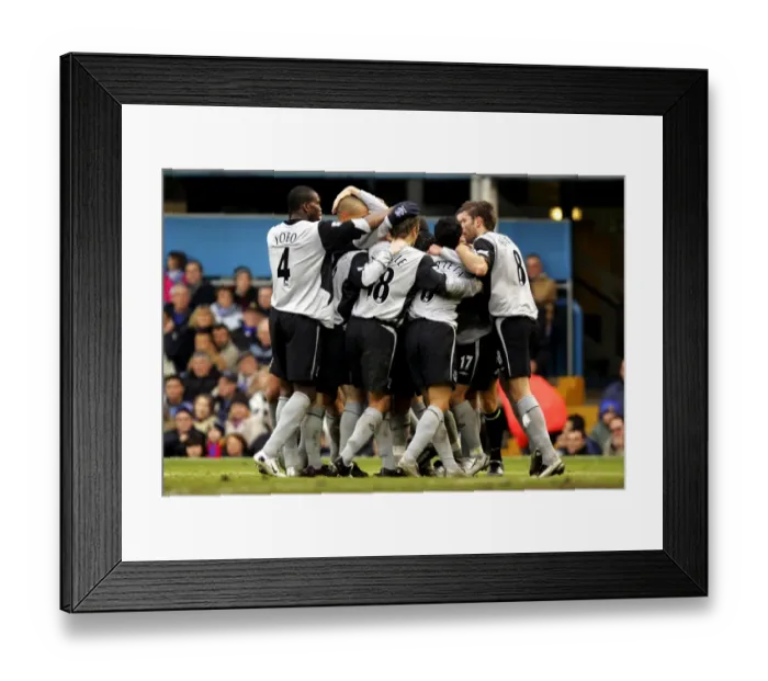Framed Print : Everton's Glorious Moment: Leon Osman Amidst Team Celebration (Portsmouth vs Everton) Framed Print : Everton's Glorious Moment: Leon Osman Amidst Team Celebration (Portsmouth vs Everton)