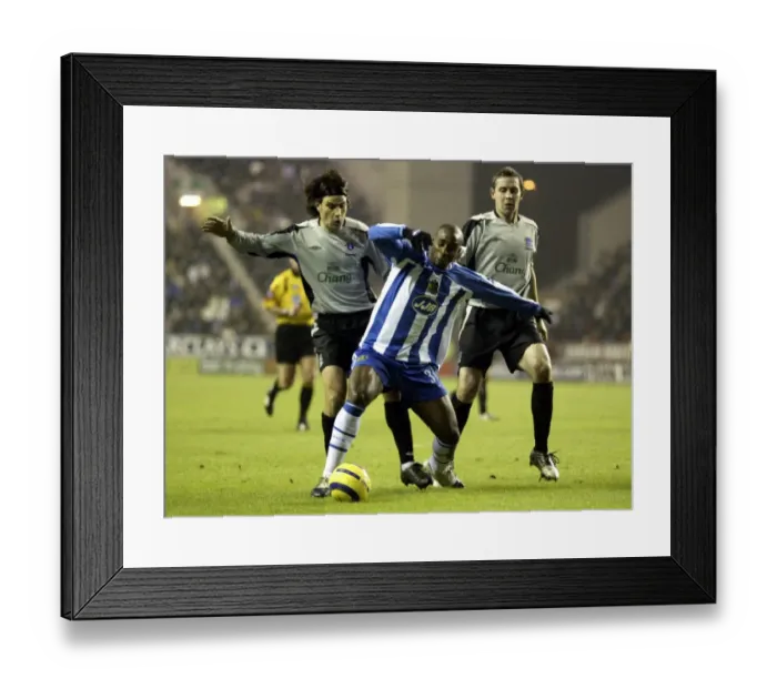 Framed Print : Intense Clash: Nuno Valente vs. Jason Roberts - A Footballing Battle on the Everton Field Framed Print : Intense Clash: Nuno Valente vs. Jason Roberts - A Footballing Battle on the Everton Field