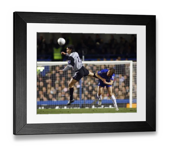 Framed Print : Nuno Valente Defies Arjen Robben: Aerial Supremacy in Football Framed Print : Nuno Valente Defies Arjen Robben: Aerial Supremacy in Football