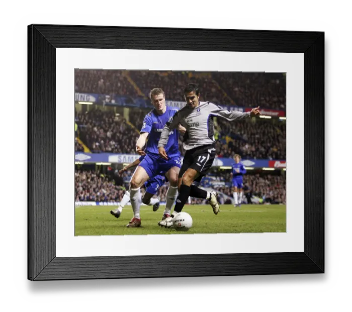 Framed Print : Tim Cahill Shields Ball from Robert Huth in FA Cup Showdown