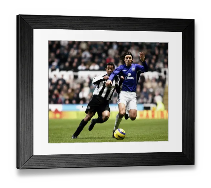 Framed Print : Clash of Football Greats: Nuno Valente vs. Nolberto Solano - A Battle at Goodison Park Framed Print : Clash of Football Greats: Nuno Valente vs. Nolberto Solano - A Battle at Goodison Park