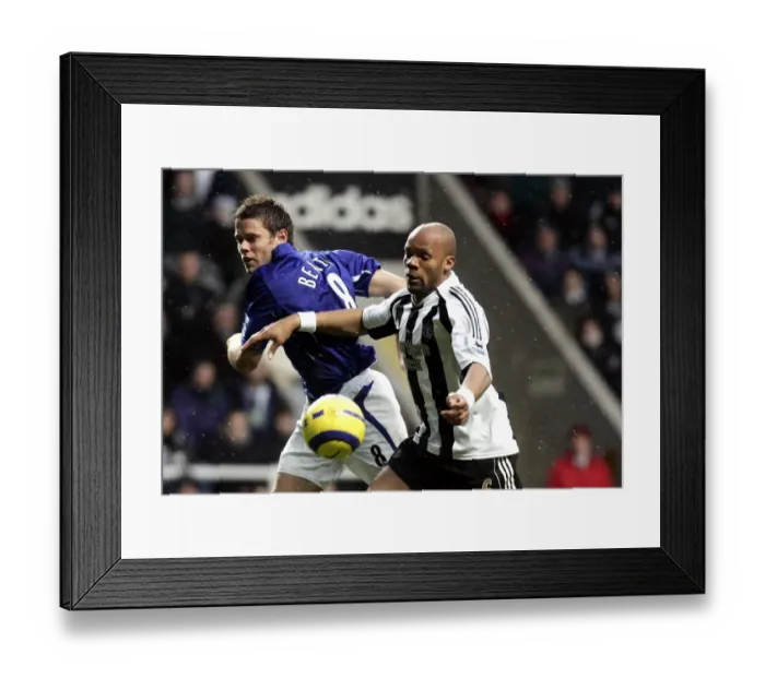 Framed Print : James Beattie vs. Jean Alain Boumsong: A Football Rivalry's Intense Moment