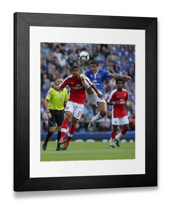 Framed Print : A Battle for Supremacy: Tim Cahill vs Denilson - Everton vs Arsenal Framed Print : A Battle for Supremacy: Tim Cahill vs Denilson - Everton vs Arsenal