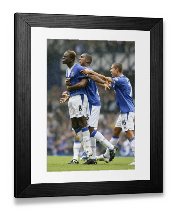 Framed Print : Everton's Dramatic Equalizer: Louis Saha's Unforgettable Goal vs. Wigan Athletic at Goodison Park Framed Print : Everton's Dramatic Equalizer: Louis Saha's Unforgettable Goal vs. Wigan Athletic at Goodison Park