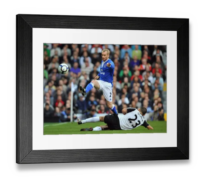 Framed Print : Clash at Craven Cottage: A Premier League Battle - Dempsey vs. Hibbert Framed Print : Clash at Craven Cottage: A Premier League Battle - Dempsey vs. Hibbert