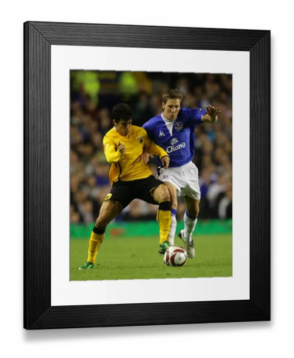 Framed Print : Intense Battle for the Ball: Everton vs AEK Athens - UEFA Europa League, Goodison Park Framed Print : Intense Battle for the Ball: Everton vs AEK Athens - UEFA Europa League, Goodison Park