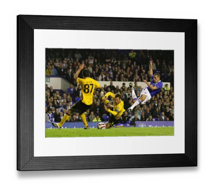 Framed Print : Battle at Goodison Park: Osman vs Arce - UEFA Europa League Showdown Framed Print : Battle at Goodison Park: Osman vs Arce - UEFA Europa League Showdown