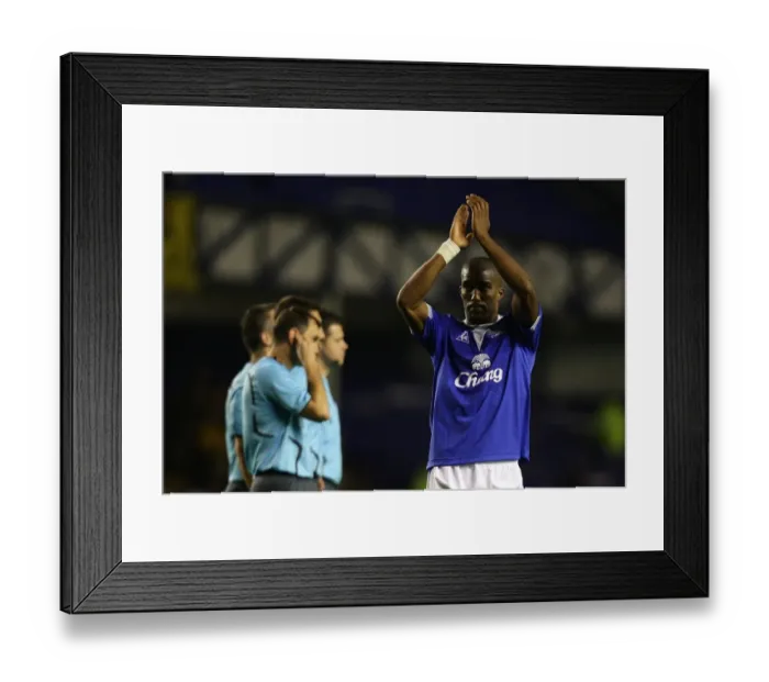 Framed Print : Everton's Sylvain Distin Celebrates Europa League Victory at Goodison Park: A Heartfelt Applause for the Faithful Fans Framed Print : Everton's Sylvain Distin Celebrates Europa League Victory at Goodison Park: A Heartfelt Applause for the Faithful Fans