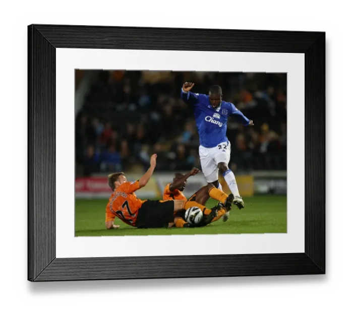 Framed Print : Everton's Yakubu Dodges Hull Defenders in Carling Cup Showdown Framed Print : Everton's Yakubu Dodges Hull Defenders in Carling Cup Showdown