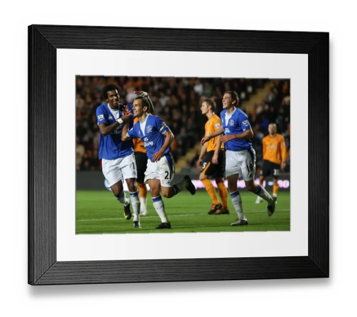 Framed Print : Leon Osman's Brace: Everton's Fourth Goal Celebration vs. Hull City in Carling Cup Framed Print : Leon Osman's Brace: Everton's Fourth Goal Celebration vs. Hull City in Carling Cup
