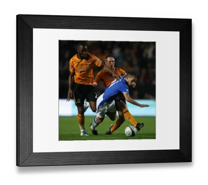 Framed Print : Determined Leon Osman's Battle: Everton vs. Hull City in Carling Cup - Overcoming Double Tackle from George Boateng and Nick Barmby Framed Print : Determined Leon Osman's Battle: Everton vs. Hull City in Carling Cup - Overcoming Double Tackle from George Boateng and Nick Barmby