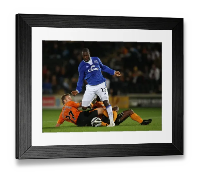 Framed Print : Everton's Yakubu Leaps Past Hull Defenders in Carling Cup Showdown Framed Print : Everton's Yakubu Leaps Past Hull Defenders in Carling Cup Showdown