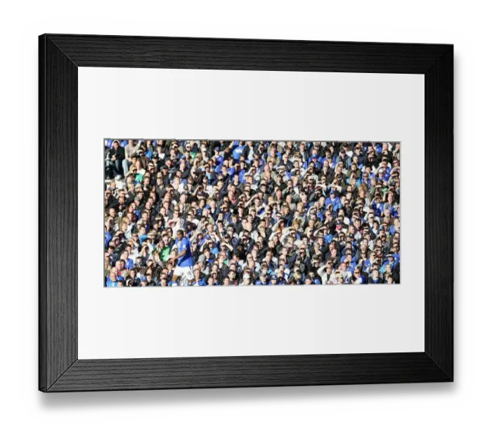 Framed Print : Everton vs Stoke City at Goodison Park: Sylvain Distin Braves Sun-Drenched Crowd Framed Print : Everton vs Stoke City at Goodison Park: Sylvain Distin Braves Sun-Drenched Crowd