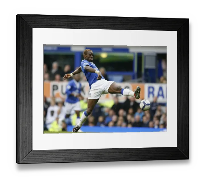 Framed Print : Everton's Louis Saha Goes for Glory: Everton FC vs. Wolverhampton Wanderers, Barclays Premier League, Goodison Park - Aiming for the Winning Goal Framed Print : Everton's Louis Saha Goes for Glory: Everton FC vs. Wolverhampton Wanderers, Barclays Premier League, Goodison Park - Aiming for the Winning Goal