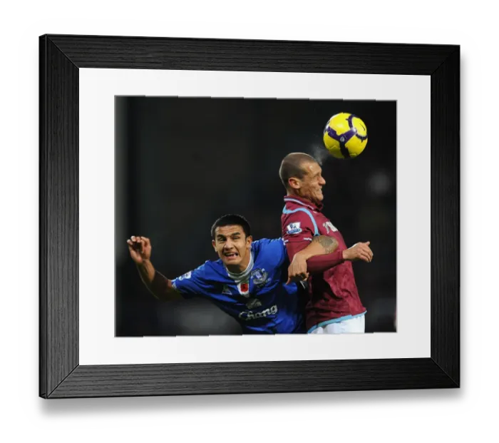 Framed Print : Battle for the Ball: Diamanti vs. Cahill - Premier League Clash between West Ham and Everton Framed Print : Battle for the Ball: Diamanti vs. Cahill - Premier League Clash between West Ham and Everton