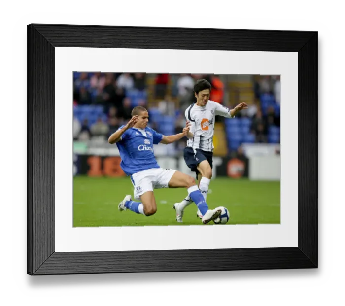 Framed Print : Intense Rivalry: Rodwell vs. Lee - Everton vs. Bolton Wanderers, Premier League Battle for Possession Framed Print : Intense Rivalry: Rodwell vs. Lee - Everton vs. Bolton Wanderers, Premier League Battle for Possession