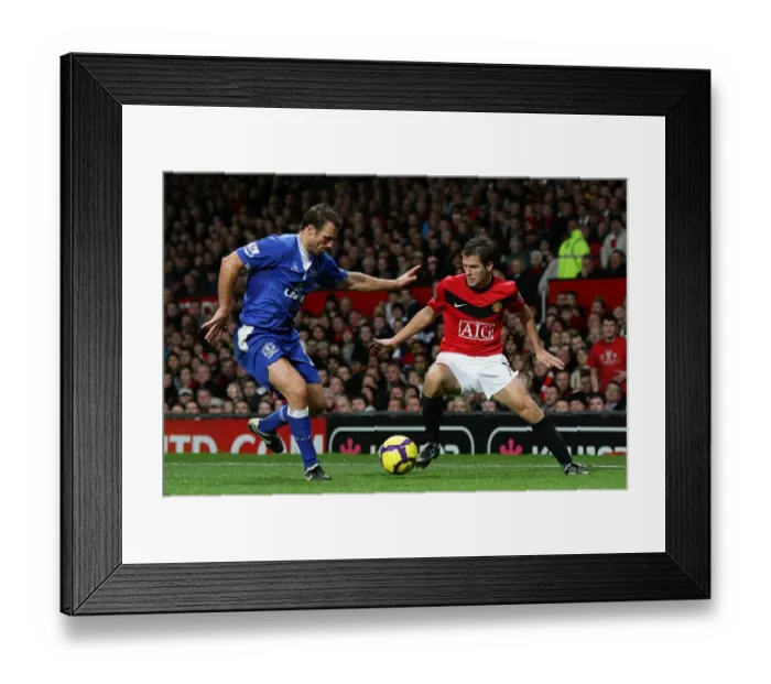 Framed Print : A Battle for Supremacy: Lucas Neill vs. Michael Owen - Manchester United vs. Everton Framed Print : A Battle for Supremacy: Lucas Neill vs. Michael Owen - Manchester United vs. Everton