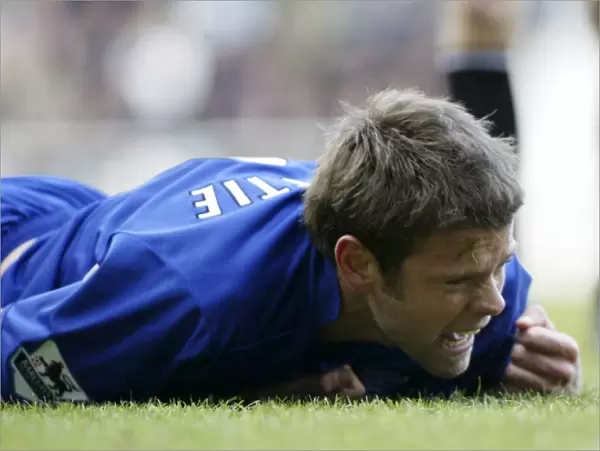 Everton's James Beattie in Action: On the Pitch Intensity