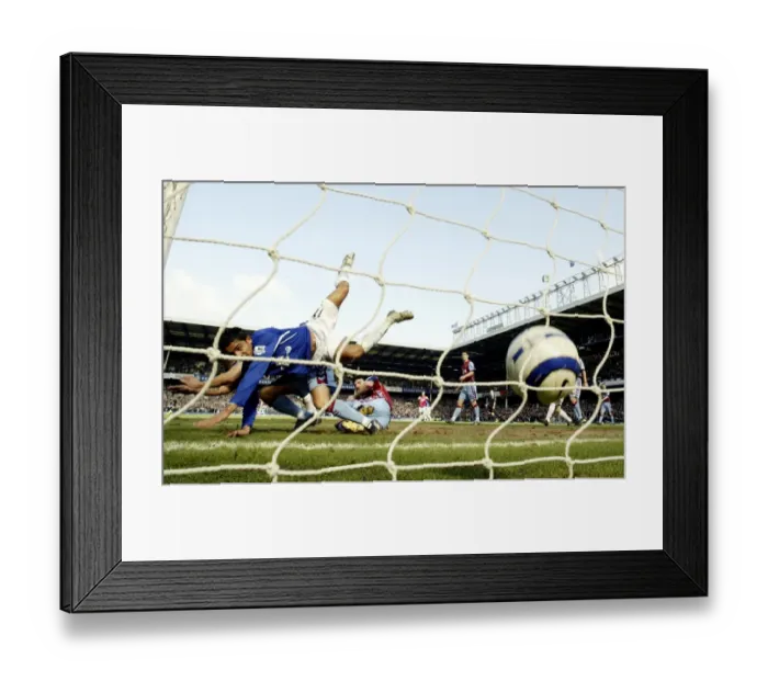 Framed Print : Tim Cahill's Unforgettable Strike: Everton's Moment of Triumph Framed Print : Tim Cahill's Unforgettable Strike: Everton's Moment of Triumph