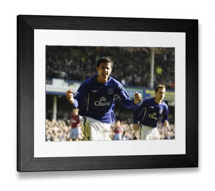 Framed Print : Tim Cahill's Euphoric Goal Celebration: Everton vs Aston Villa Framed Print : Tim Cahill's Euphoric Goal Celebration: Everton vs Aston Villa