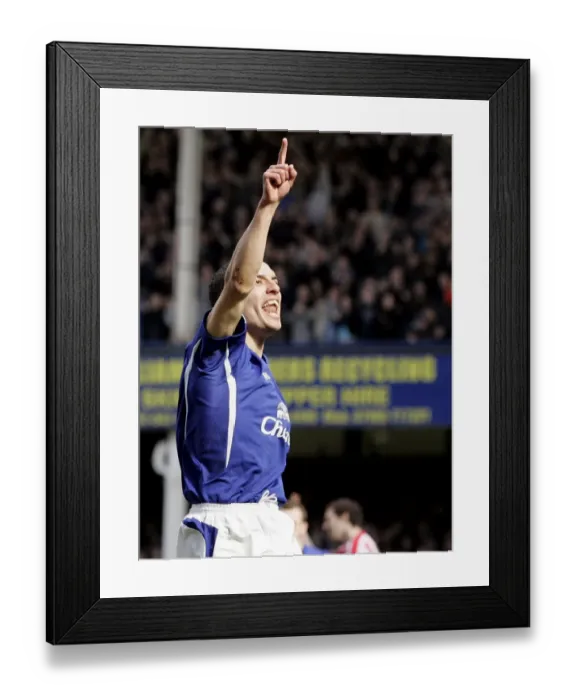 Framed Print : Leon Osman Scores the Opener: Everton's Thrilling Victory Moment Framed Print : Leon Osman Scores the Opener: Everton's Thrilling Victory Moment