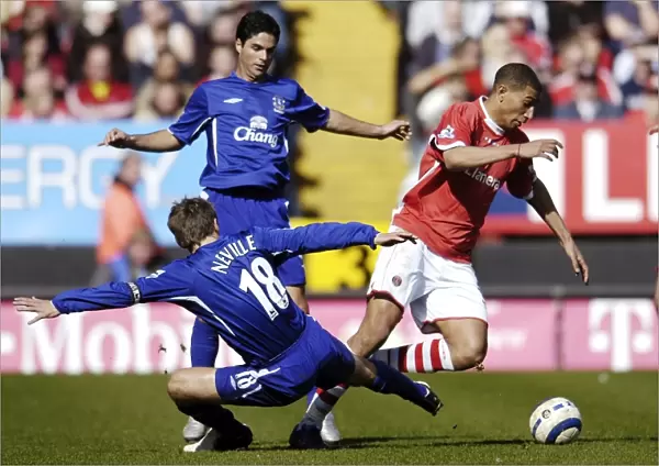 Phil Neville and Mikel Arteta