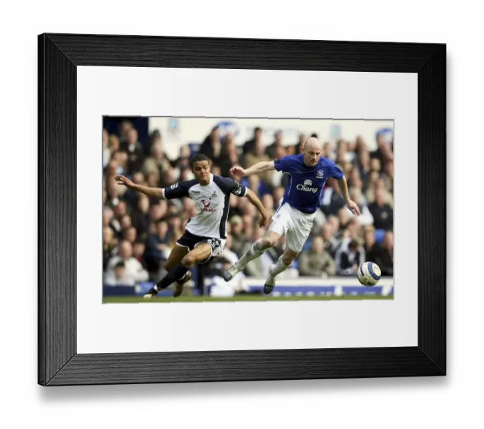 Framed Print : Escaping the Challenge: Lee Carsley Outmaneuvers Jermaine Jenas Framed Print : Escaping the Challenge: Lee Carsley Outmaneuvers Jermaine Jenas