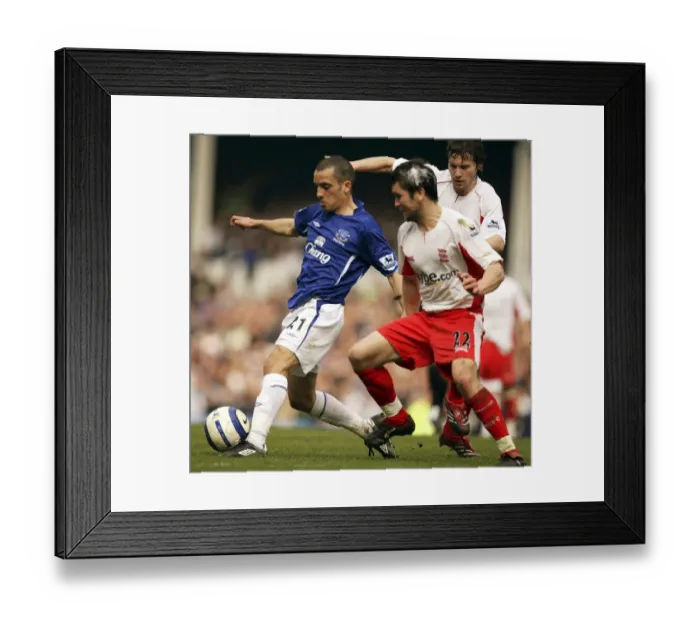 Framed Print : Everton's Agile Midfielder Leon Osman Outmaneuvers Birmingham Defenders