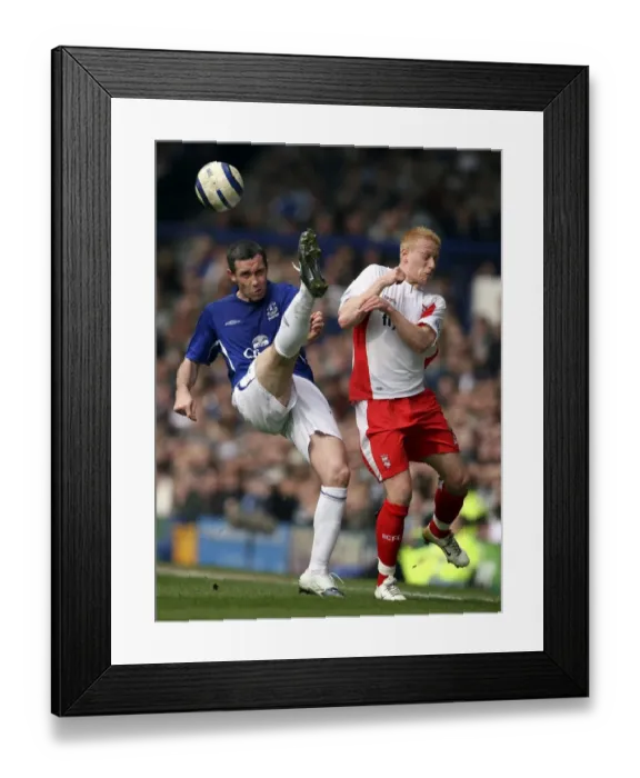 Framed Print : David Weir Blocks Mikael Forssell: Everton's Defensive Hero Framed Print : David Weir Blocks Mikael Forssell: Everton's Defensive Hero