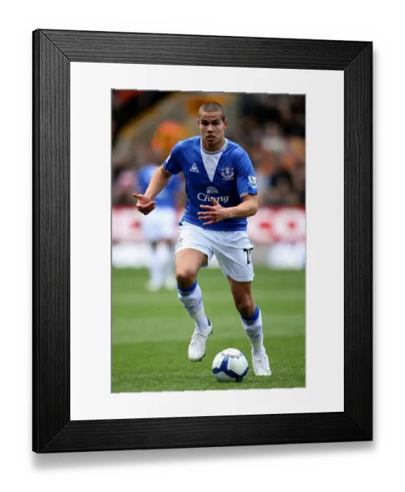 Framed Print : Jack Rodwell vs. Wolverhampton Wanderers: Everton's Midfield Battle in the Barclays Premier League Framed Print : Jack Rodwell vs. Wolverhampton Wanderers: Everton's Midfield Battle in the Barclays Premier League