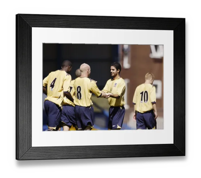 Framed Print : Everton's Unforgettable Moment: Arteta and Johnson's Emotional Team Celebration - The Thrill of Victory Framed Print : Everton's Unforgettable Moment: Arteta and Johnson's Emotional Team Celebration - The Thrill of Victory