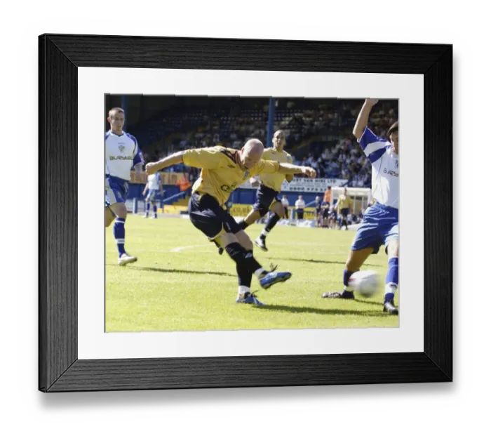 Framed Print : Andy Johnson's Powerful Shot for Everton