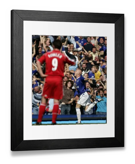 Framed Print : Everton's Johnson: Thrilling Goal Celebration Amidst Roaring Fans