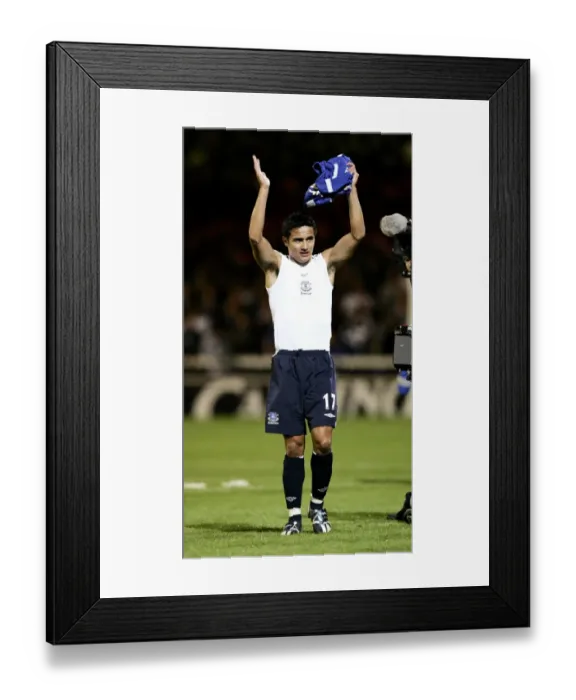Framed Print : Peterborough United v Everton Tim Cahill applauds the travelling fans at the end of the match Framed Print : Peterborough United v Everton Tim Cahill applauds the travelling fans at the end of the match