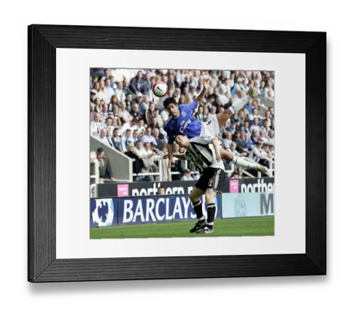Framed Print : Clash of Midfield Titans: Arteta vs. Milner - Everton vs. Newcastle United, Barclays Premiership, St. James Park (2006)