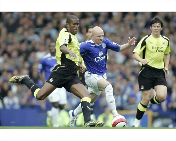 Manchester Citys Sylvain Distin battles with Evertons Andrew Johnson