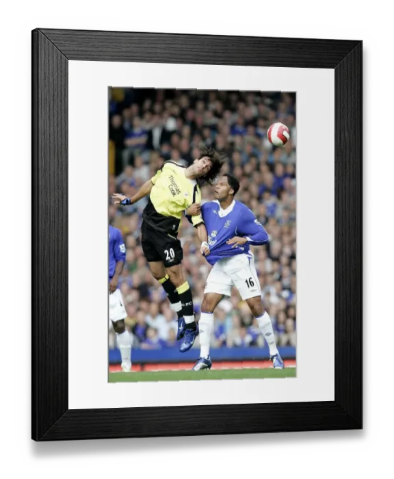 Framed Print : Everton v Manchester City Manchester Citys Georgios Samaras challanges for a header with Everton s Framed Print : Everton v Manchester City Manchester Citys Georgios Samaras challanges for a header with Everton s