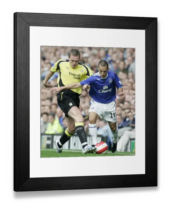 Framed Print : Everton v Manchester City - Evertons Leon Osman battles with Manchester Citys Richard Dunne Framed Print : Everton v Manchester City - Evertons Leon Osman battles with Manchester Citys Richard Dunne