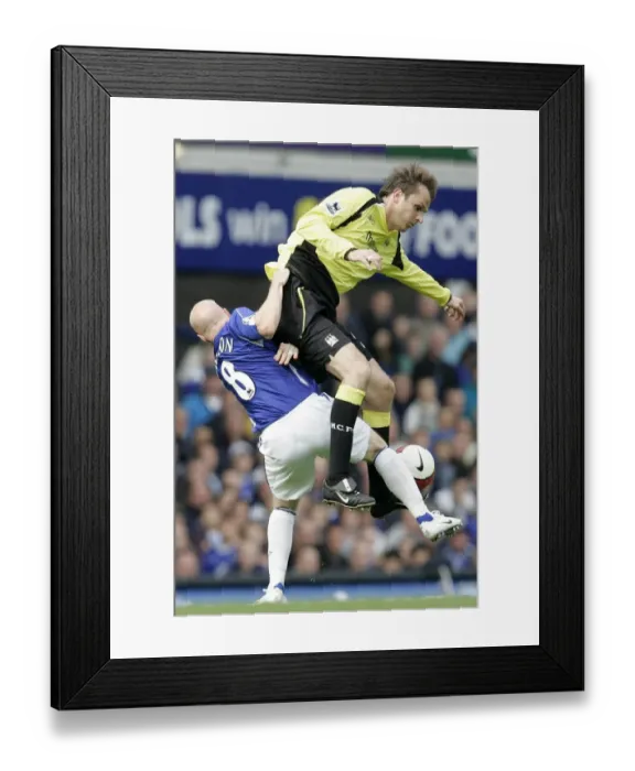 Framed Print : Intense Rivalry: Hamann vs. Johnson Clash at Goodison Park (Everton vs. Manchester City, Premiership 2006) Framed Print : Intense Rivalry: Hamann vs. Johnson Clash at Goodison Park (Everton vs. Manchester City, Premiership 2006)