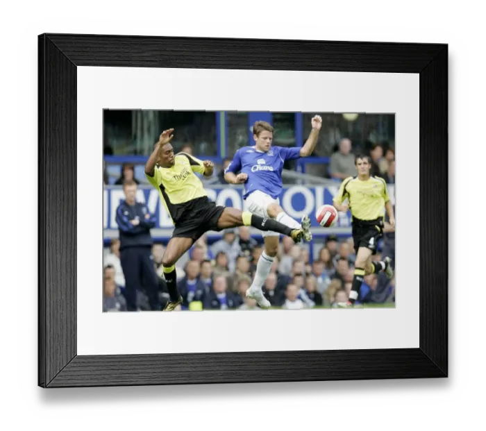 Framed Print : Everton v Manchester City Manchester Citys Sylvain Distin and Evertons James Beattie Framed Print : Everton v Manchester City Manchester Citys Sylvain Distin and Evertons James Beattie
