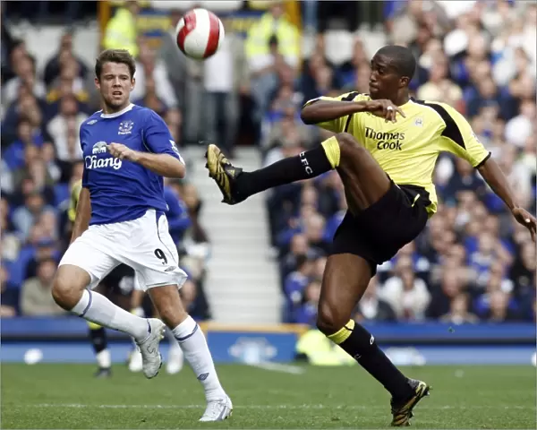 Everton v Manchester City James Beattie of Everton in action against Sylvain Distin of Manchester City