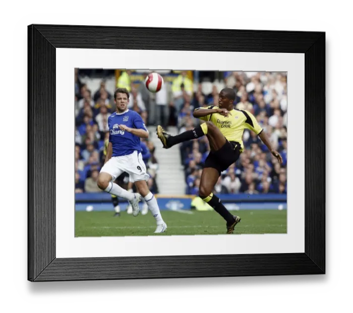 Framed Print : Everton v Manchester City James Beattie of Everton in action against Sylvain Distin of Manchester City Framed Print : Everton v Manchester City James Beattie of Everton in action against Sylvain Distin of Manchester City