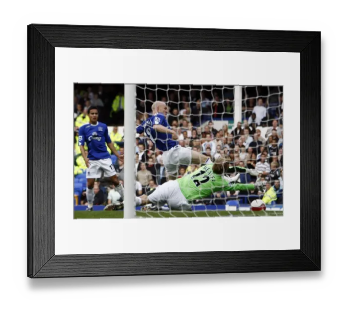 Framed Print : Everton v Manchester City Andy Johnson of Everton in action against Manchester City goalkeeper Nicky Framed Print : Everton v Manchester City Andy Johnson of Everton in action against Manchester City goalkeeper Nicky