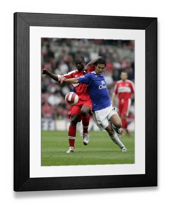 Framed Print : George Boateng vs. Tim Cahill: A Fierce Rivalry Unfolds at The Riverside Stadium Framed Print : George Boateng vs. Tim Cahill: A Fierce Rivalry Unfolds at The Riverside Stadium