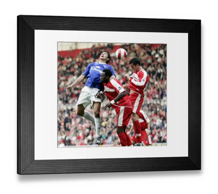 Framed Print : The Riverside Stadium - Tim Cahill of Everton in action against Andrew Taylor Framed Print : The Riverside Stadium - Tim Cahill of Everton in action against Andrew Taylor